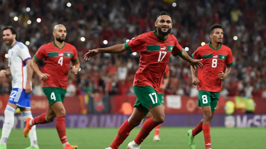 Morocco national team players with experience in European football leagues celebrating together, highlighting the influence of overseas-based talent on the Atlas Lions' success.