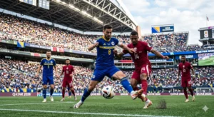 Bosnia-Herzegovina and Qatar players battle for the ball during their Group B match at Lumen Field in the 2026 FIFA World Cup.