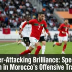 Morocco national team players launching a rapid counter-attack, sprinting forward with speed and precision after winning possession during an international football match.