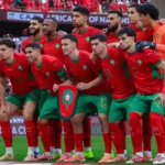 Morocco national team forwards celebrating a goal during an international match, highlighting the attacking talent and goal-scoring ability of the Atlas Lions.