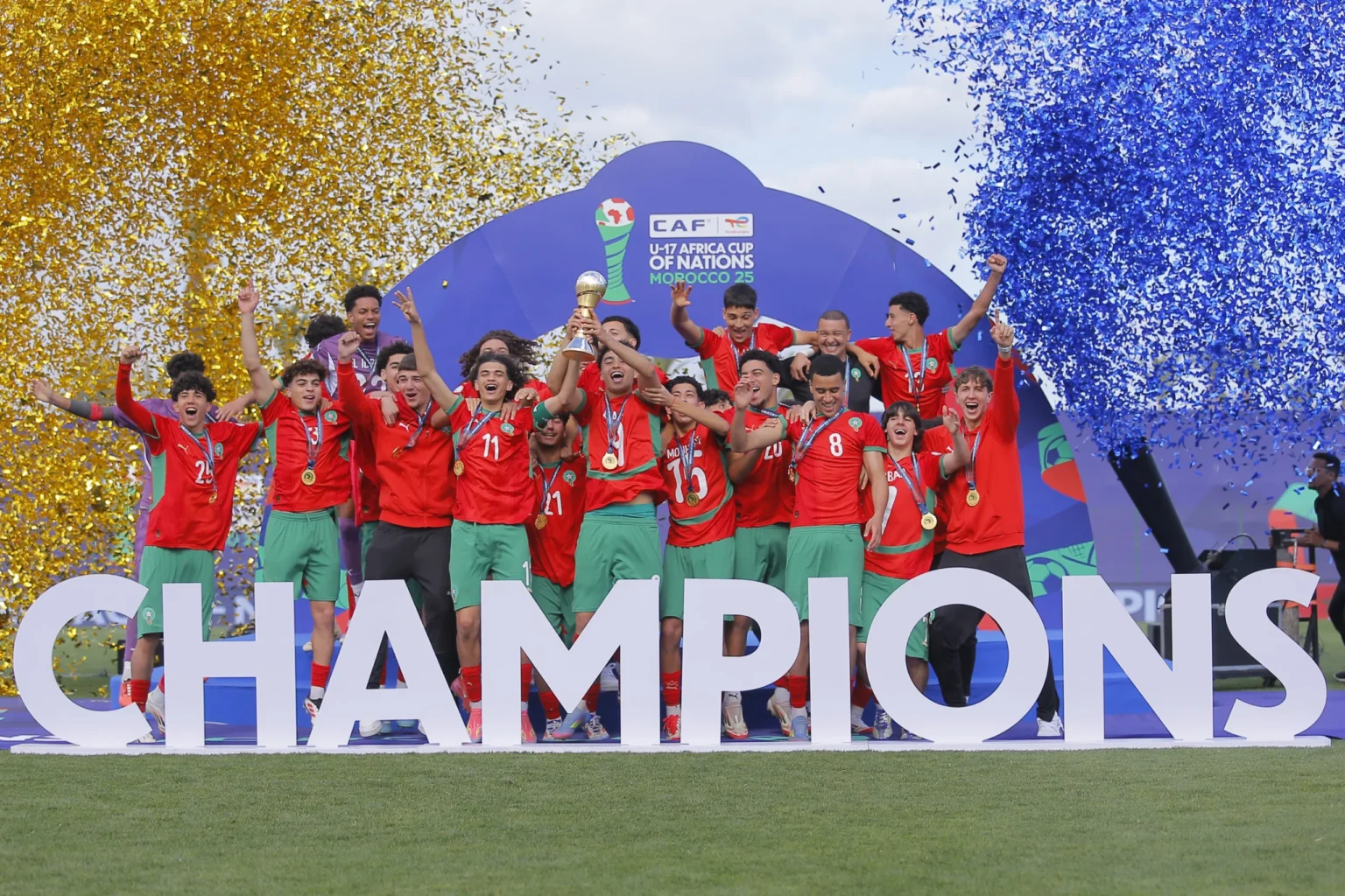 Morocco national football team players celebrating a historic victory, representing the rich history, achievements, and enduring legacy of the Atlas Lions.
