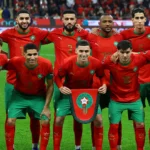 Morocco national team coaching staff observing players during matches and training sessions, evaluating performance, fitness, and tactical suitability for squad selection.