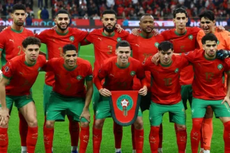 Morocco national team coaching staff observing players during matches and training sessions, evaluating performance, fitness, and tactical suitability for squad selection.