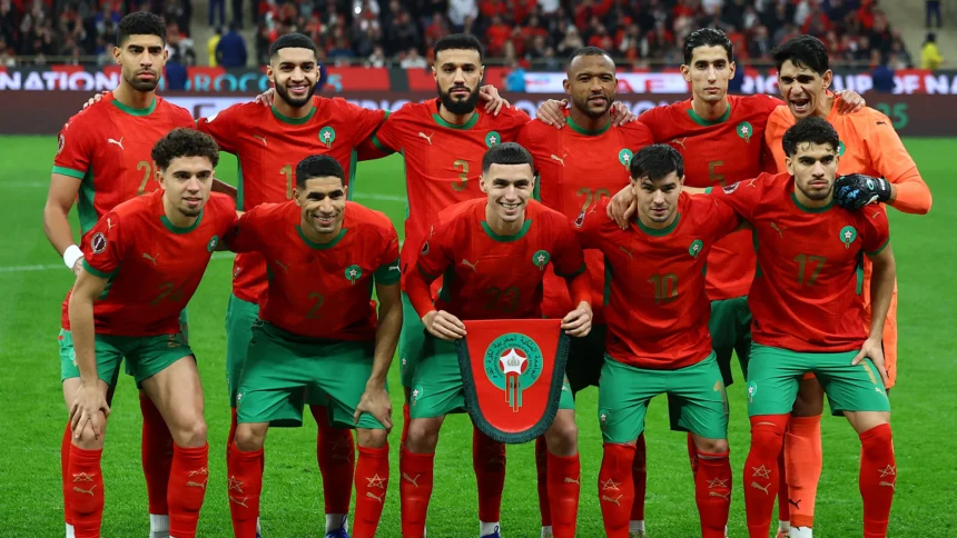 Morocco national team coaching staff observing players during matches and training sessions, evaluating performance, fitness, and tactical suitability for squad selection.
