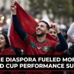 Morocco national team players from diverse international backgrounds celebrating together during the FIFA World Cup, highlighting the contribution of the Moroccan diaspora to the Atlas Lions' success.