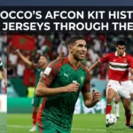 Collection of Morocco national team AFCON jerseys from different eras, showcasing the evolution of the Atlas Lions' iconic red and green football kits through the years.
