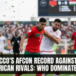 Morocco national team competing against North African rivals in Africa Cup of Nations matches, showcasing intense regional football rivalries and historic continental encounters.