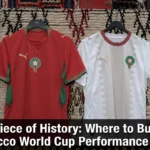 Official Morocco national team jerseys, scarves, caps, and training apparel displayed for fans looking to own authentic Atlas Lions World Cup memorabilia.
