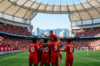 Canada players celebrate during their Group B match against Qatar at BC Place Stadium, Vancouver, in the 2026 FIFA World Cup