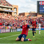 Erling Haaland celebrates after scoring twice in Norway’s 4-1 World Cup win over Iraq in Boston.