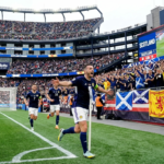 John McGinn celebrates Scotland's winning goal against Haiti at the 2026 FIFA World Cup in Gillette Stadium, Boston.