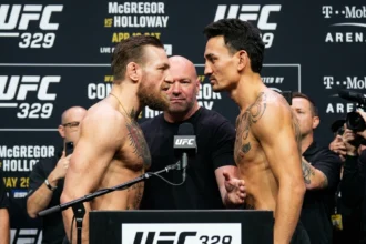 Conor McGregor vs Max Holloway UFC 329 fight poster with date and Las Vegas venue details.