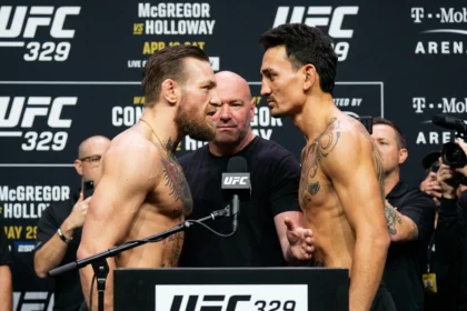Conor McGregor vs Max Holloway UFC 329 fight poster with date and Las Vegas venue details.