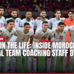 Morocco national football team players pose together on a stadium field.