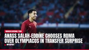 Anass Salah-Eddine smiling in maroon top, Roma transfer news.