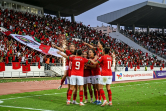 Morocco's women's national team players celebrate during their WAFCON 2026 Group A match against Senegal at a packed stadium in Rabat.