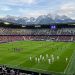Real Madrid players in white warm up against Fiorentina in purple ahead of their August 2026 preseason friendly at Wörthersee Stadion, Klagenfurt.
